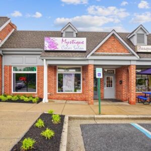 The storefront of Mystique Color Salon, a local beauty salon in Frederick, MD.