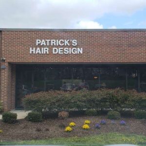 The storefront of Patrick's Hair Design, a salon in Columbia, MD.