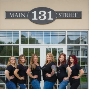 The storefront of Styled Salon in Prince Frederick with their employees.